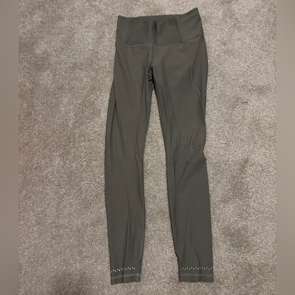 Lululemon Leggings in a deep green.